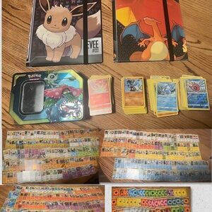 Pokemon Card Collection bundle over 500 cards, 2 binders and 1 tin